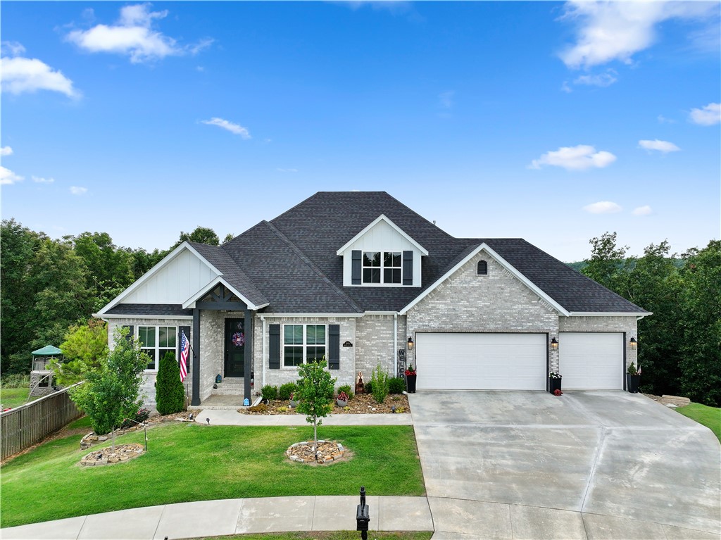 Like BRAND NEW only better with the added outdoor living area. This 4 bedroom, 4 bath home has an office, formal dining AND breakfast room. Open floor plan with beautiful entryway. There are two bedrooms on the main level and two on the lower level each with their own baths. Two living areas, a wet bar downstairs and a butler pantry up, walk in pantry and stand alone laundry that connects to the primary bedroom closet. There is also a storage room in the basement area. Outside living areas upstairs and down. Separate outdoor fireplace and firepit areas. Outdoor kitchen with pizza oven. Amazing privacy with the woods behind the home. Coler is just down the hill! Perfection! Welcome home!