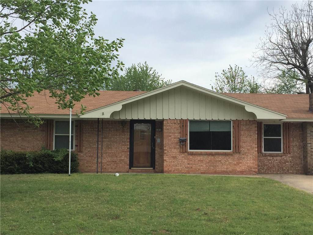 Plenty of room in this brick 3 bedroom, 2 1/2 bath home! Home sits on a corner lot and features 2 separate living spaces - one with rock fireplace and half bath, eat in kitchen and large utility room. You'll enjoy outdoor living in the over sized back yard and covered patio. Terrific location close to schools, stores, restaurants and I-49!