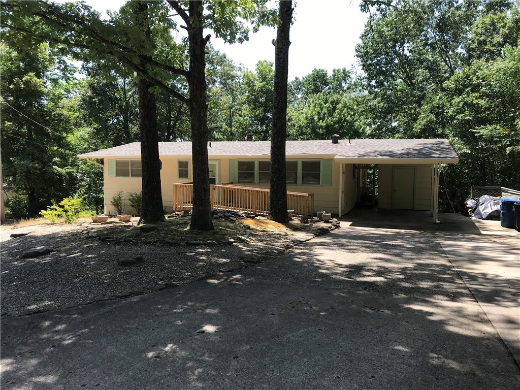 Clean and neat classic 2 bedroom, 1.5 bath Bella Vista style home. Home is partially set up with handicap ramp to front entry door and accessible shower and handrails.