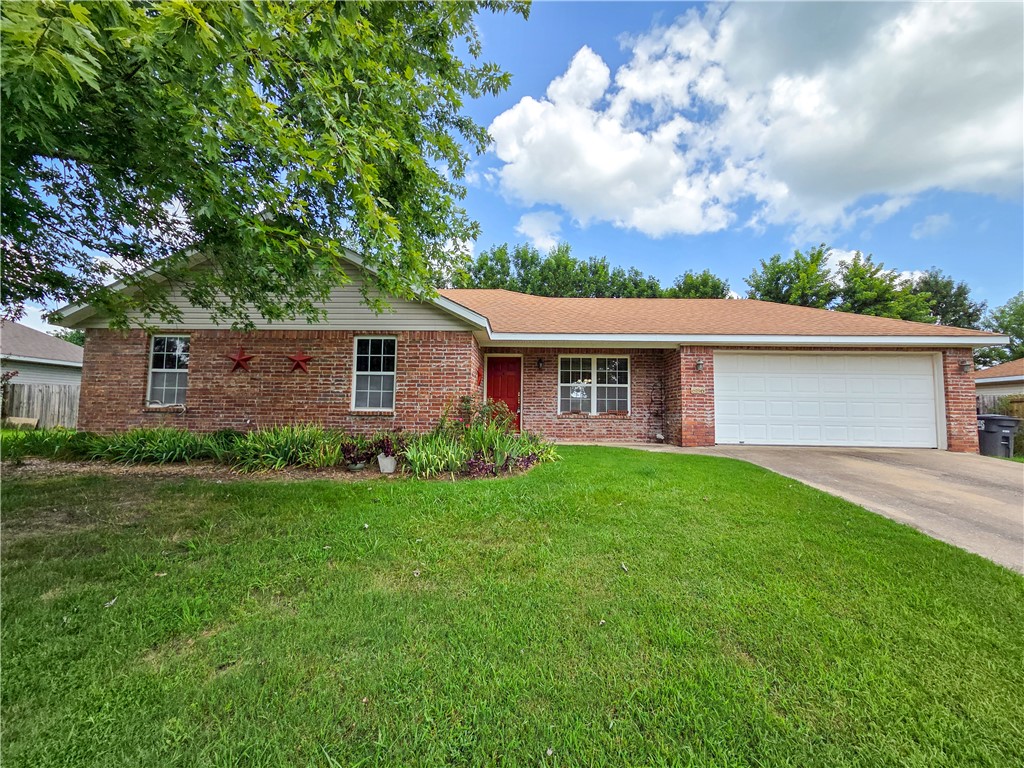 Well-maintained, move-in-ready home in the heart of Elkins! Inside you'll find attractive flooring, warm paint colors, comfortable carpet, and a spacious living room with a vaulted ceiling that creates an open, inviting feel. The primary suite features two closets, including a large walk-in closet. Enjoy the peaceful back porch overlooking the fully fenced backyard—perfect for relaxing, entertaining, or pets. The garage has been partially converted into an additional bedroom, providing flexible space for guests, a home office, or hobbies. This finished room is not included in the home's stated square footage. Located in the growing community of Elkins, you'll enjoy small-town charm with a short drive to Fayetteville, plus nearby parks, Richland Creek, and plenty of outdoor recreation. Don't miss this wonderful opportunity!