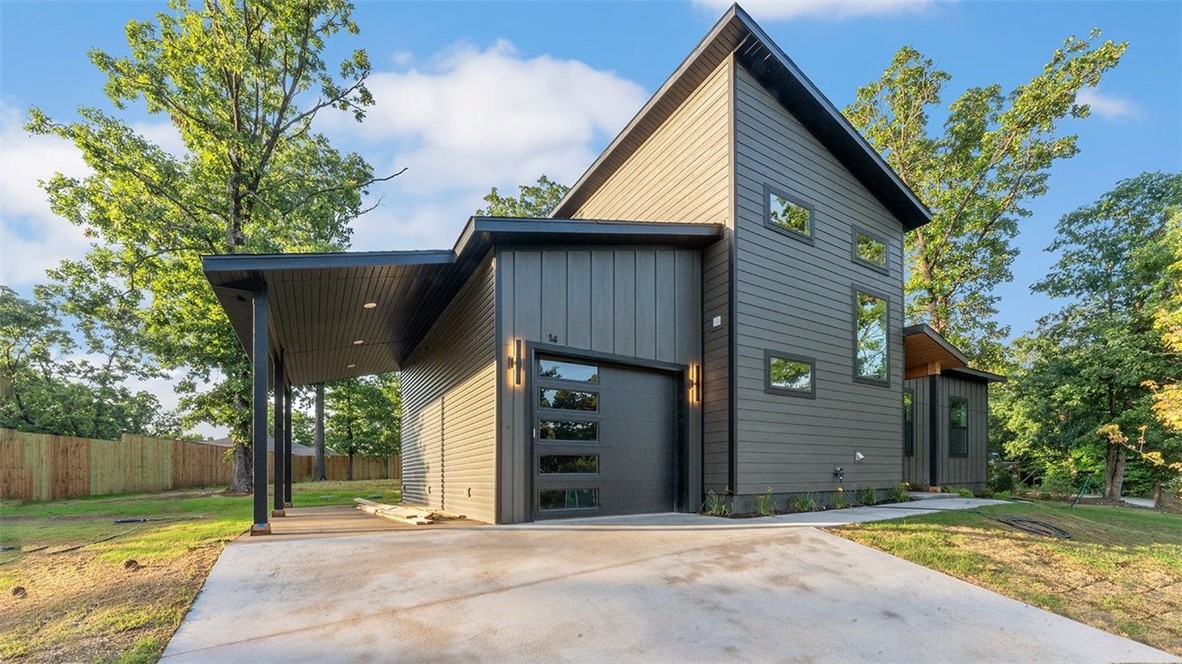 Experience modern living in this unique new construction home featuring an open-concept floor plan. Built with superior efficiency in mind, the home utilizes Zip System exterior sheathing for a tighter envelope and solar board roof decking to keep the attic up to 30 degrees cooler in the Summer. The interior is highlighted by premium LVP flooring, quartz countertops, and extensive built-in cabinetry throughout. The kitchen is a chef’s dream, offering an eat-at island bar, a spacious pantry, and an extended back counter perfect for entertaining. The upstairs master suite includes a walk-in closet and a private bath, while the living area features a cozy fireplace ideal for gathering. Located just moments from the Tweety Bird and Tunnel Vision mountain biking trails, this home puts you at the center of the best local recreation. Don't miss this opportunity to own a high-efficiency home in a prime location.
