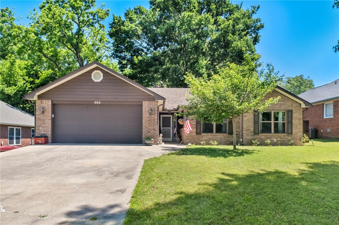 Located in an established cul-de-sac neighborhood with no HOA, this well-maintained 3-bedroom, 2-bath home offers comfort, convenience, and recent updates. Just minutes from downtown Siloam Springs and the historic district, with parks, the Siloam Family Aquatic Center, schools, and shopping nearby. The living room features a recessed ceiling, fireplace, and new French doors leading to the patio. The kitchen includes a breakfast area plus an additional dining/flex space ideal for an office or playroom. Large windows throughout provide abundant natural light. The primary suite offers a walk-in closet and private bath, while the secondary bedrooms include custom-fit blinds. Roof was replaced in 2024. In 2025 Yard was fenced, new gutters with leaf guard installed. Home is move in ready & well maintained to provide a peace of mind for the next owner.
