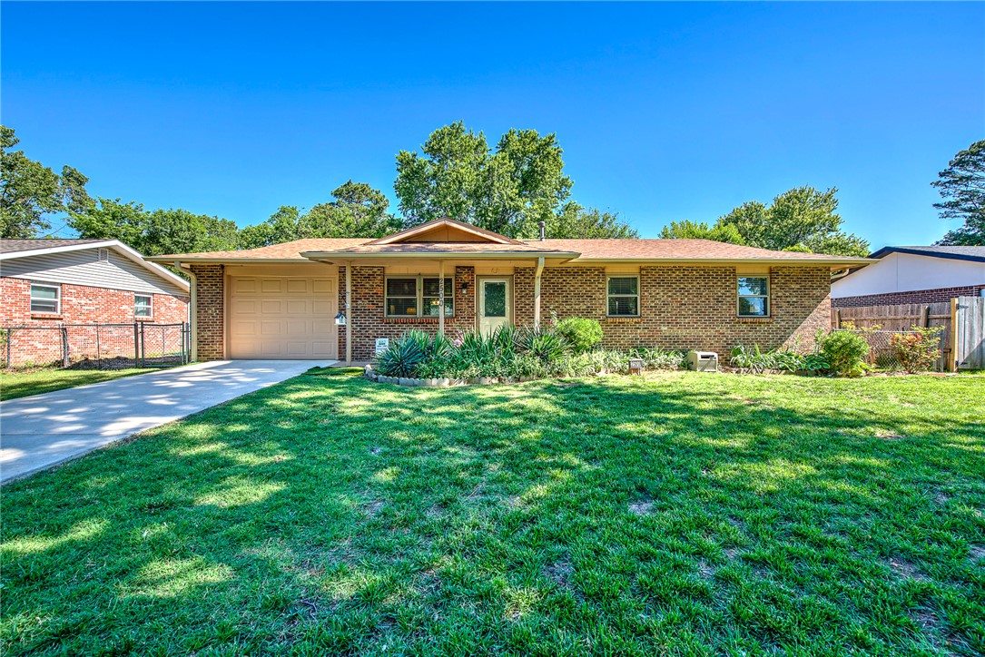Discover a move-in ready home that offers a comfortable and inviting atmosphere, perfect for crafting your ideal lifestyle. The hall bathroom provides the convenience  and functionality of an updated ADA compliant walk-in shower with an added barn door for a modern look. With 3 bedrooms and 1.5 bathrooms, this ranch-style home provides practical living spaces. An attached garage and a storage unit in the backyard offers extra storage, while a dedicated laundry room simplifies daily routines.  This property presents a unique opportunity to embrace comfortable living in a desirable location.  Don't miss the attached list of updates!  This house has had all the hard work completed so you can move in, make it yours and enjoy without worry!