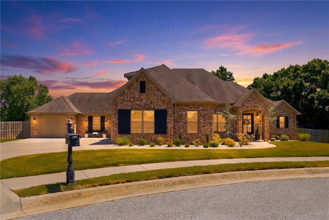 Welcome home to 200 Grimsdell Circle! Private resort-style living meets timeless craftsmanship in this custom Mark Melton home nestled on a .63 acre, cul-de-sac lot in highly sought-after Otter Creek Estates. Built in 2016, this stunning home was designed with both luxury & functionality in mind. The layout places nearly all living spaces on the main level, including an office, while the upstairs offers a bedroom/bonus space with its own private bath. At the heart of the home, an expansive open-concept living area showcases beautiful wood beam accents, creating warmth & architectural character. The primary suite is a true sanctuary, offering a luxurious spa-inspired bath. Step outside to your own private backyard oasis. The heated saltwater pool serves as the centerpiece of the beautiful backyard, surrounded by mature landscaping & generous patio spaces designed for relaxing, gathering & enjoying Northwest Arkansas' beautiful seasons. This home is a retreat designed for the way you want to live.