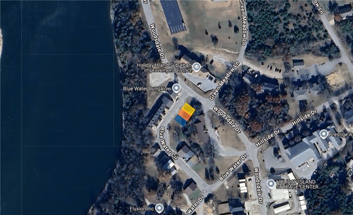 Build your business on this .10 (+/-) acre lot in Holiday Island that is by the water and Holiday Island Marina!! It is close to local amenities and Eureka Springs as well. Property conveys a Limited Warranty Deed. Call or text for more information.