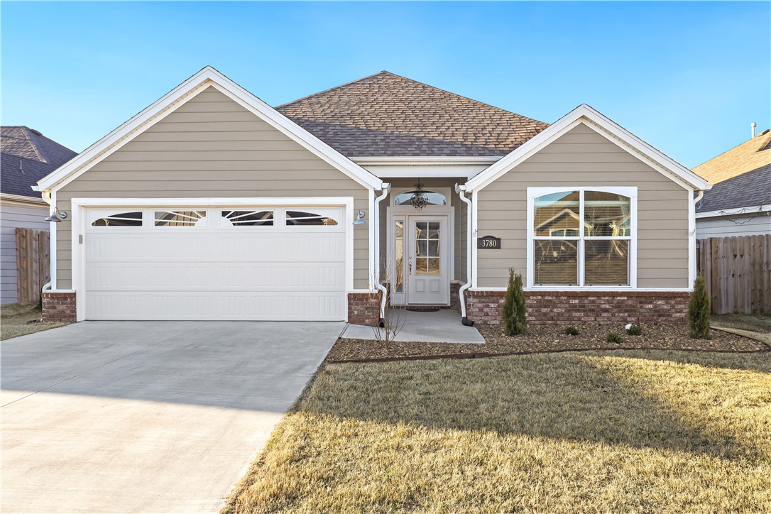 Beautiful 3 bed 2 bath home conveniently located in the desired Habberton Ridge subdivision. This home is a very short distance from Charlie Willie George park, which offers an abundance of family entertainment. From Springdale's newest splash park, to baseball fields, soccer, tennis, playgrounds, dog park, and so much more! If you are looking for the perfect home, look no further. Home features include privacy fence, gutters, LVP wood flooring, granite counters, upgraded stainless steel appliances, two pantries, 10' ceilings, upgraded light fixtures, and so much more. Relax on the covered patio, and enjoy the beautifully enhanced landscaped yard.