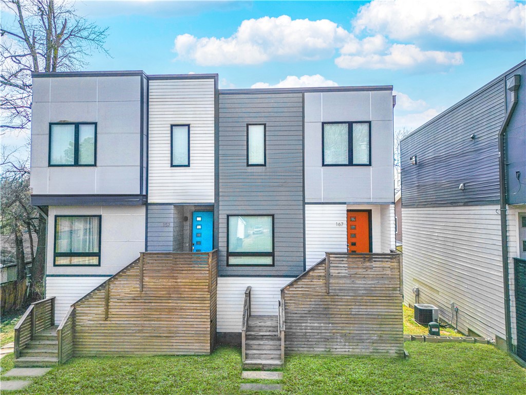 Steps from the University of Arkansas and just minutes from Dickson Street and downtown, this 3-bedroom, 2.5-bath townhome on MLK Blvd delivers a rare combination in Fayetteville: unbeatable walkability and unmatched parking. A 2-car garage plus two dedicated exterior spaces means never circling the block for a spot — a serious advantage in this high-demand corridor. Inside, an open-concept living area flows into a kitchen with pantry storage, while a bonus storage room off the garage keeps bikes, gear, and seasonal items out of the way. The refrigerator, washer, dryer, and microwave convey with an acceptable offer. Whether you're looking for a low-hassle home base near campus, a turnkey rental property, or a smart long-term hold in one of Fayetteville's most active corridors, this location checks every box: walkable to campus, close to shopping and dining, and connected to major commuter routes. Also listed for lease. See MLS 1343715