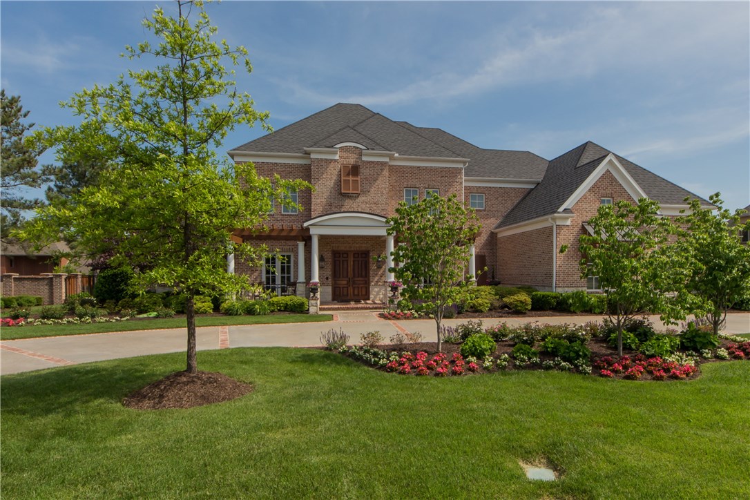 Custom built Grand Estate with circular driveway an lush landscaping. State of the art technology. Large open living area and grand kitchen perfect for entertaining.  Master with additional 15x15 sitting room. Cherry wood flooring throughout, crown molding, granite, cedar closet, stone surround wood burning fireplace, built-ins, covered veranda with built-in grill, prep sink and fireplace.