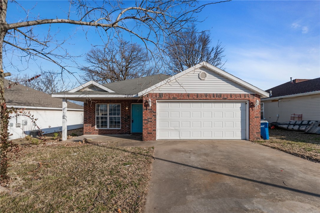 Welcome to 2400 SW Choctaw Street in Bentonville, Arkansas! This well-maintained 3-bedroom, 2-bath home offers a fantastic location close to 8th Street & nearby shopping. Inside, you’ll find a spacious living room with wood laminate flooring & a cozy corner gas fireplace, creating a warm & inviting space. The island kitchen features an eat-in dining area & wood laminate floors that flow seamlessly into the living room. The split-bedroom layout provides added privacy, with the primary suite separated from the secondary bedrooms. Step outside to a great backyard with full privacy fencing, perfect for gatherings, pets, or quiet evenings outdoors. Currently leased beginning in March, this property offers immediate rental income & makes a fantastic investment opportunity in one of Bentonville’s most desirable & fast-growing areas.