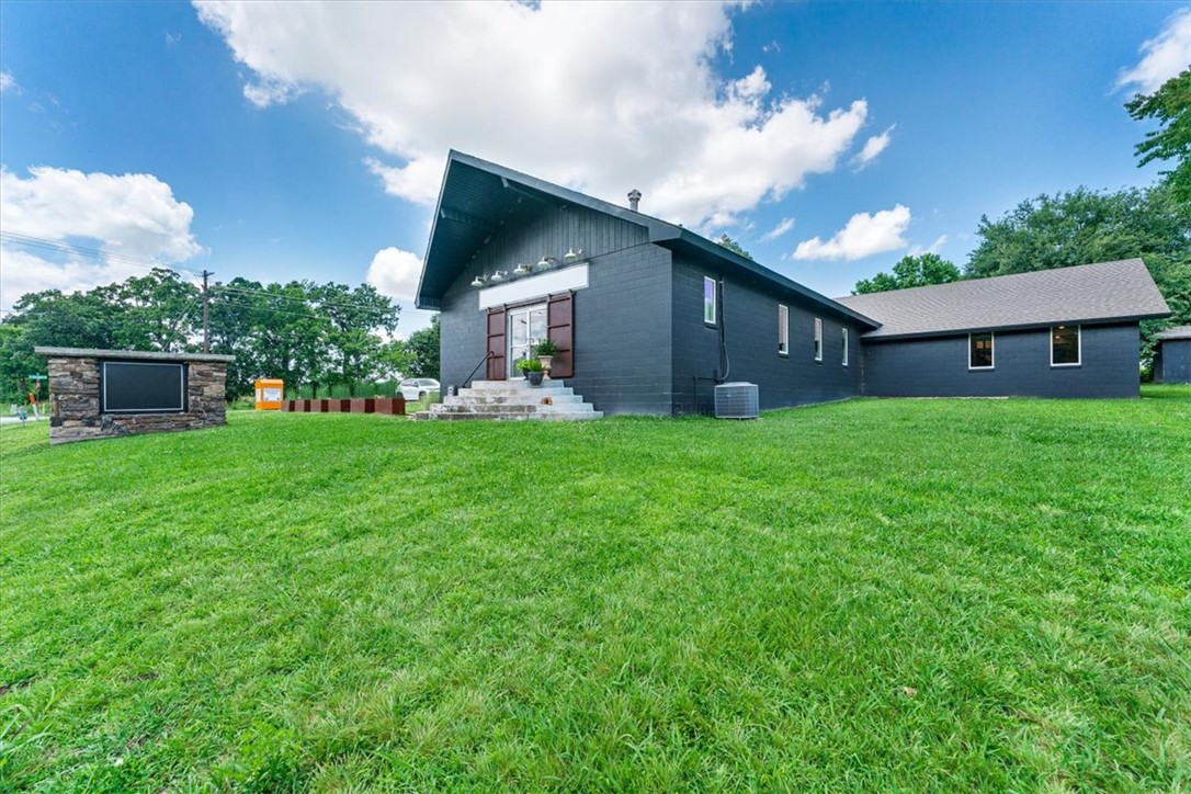 Exceptional opportunity just 10 min to Pinnacle Hills! This unique property offers over 4,000 square feet of beautifully remodeled retail, event, or gathering space, a 2,400 square foot warehouse, and a separate fully remodeled residence, creating endless possibilities for business, investment, or live/work flexibility.The versatile commercial space could have a variety of uses including retail, office, meeting/training space, event venue, retreat center,showroom, wellness center, church/ministry operations, nonprofit headquarters, educational programs, and more. The warehouse provides valuable storage, distribution, workshop, or operational space, while the separate residence offers additional flexibility for owner occupancy, guest accommodations, employee housing, or income-producing opportunities. Seller will consider selling the retail and warehouse separately from the residence;the residence will not be sold separately from the commercial property. Buyer to verify all measurements, zoning, and permitted uses.
