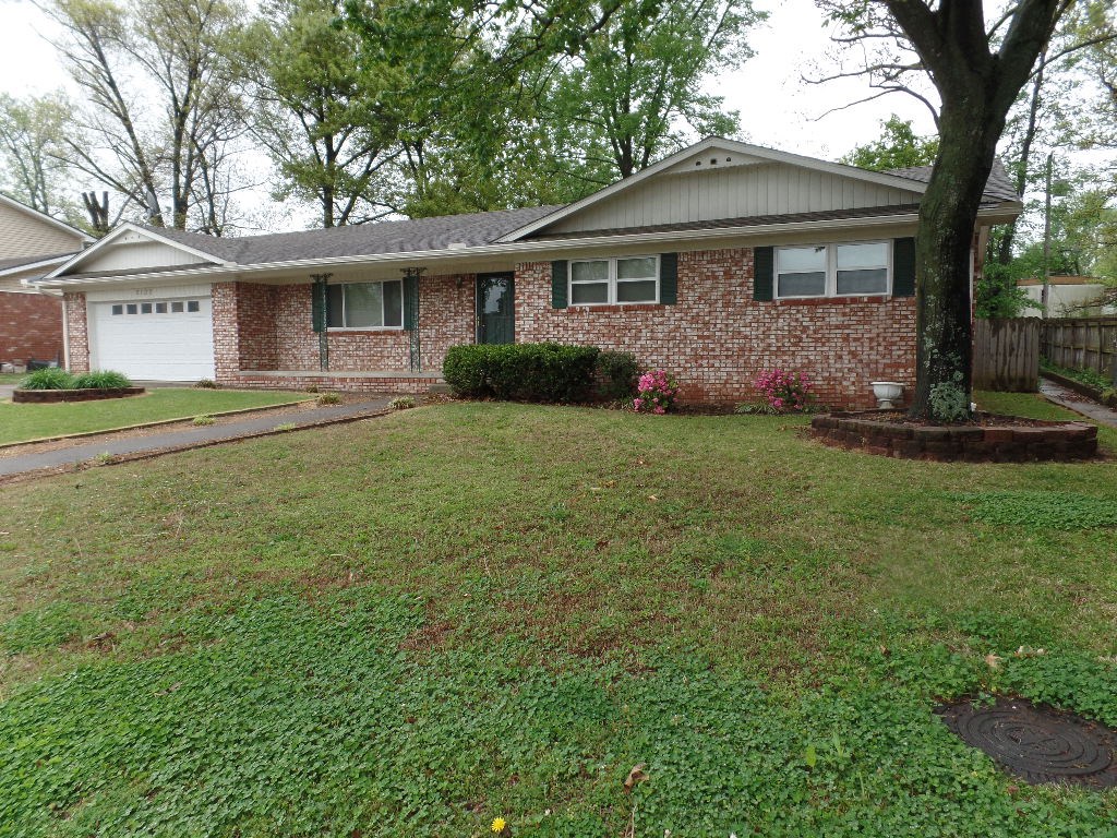 Very nice all brick house located in an established neighborhood. New vinyl windows and blinds. Lots of storage space! New kitchen gas range, double oven. Beautiful back yard with a nice 20 x 16 deck. 10 x 10 storage building.