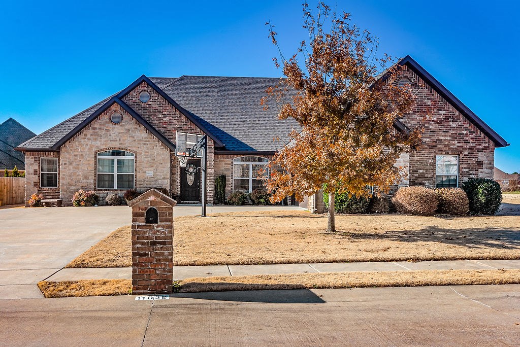 Beautiful, well maintained brick home with 4 bedrooms, two bathrooms that sits on over a third of an acre lot.  This home has all the features that you have been looking for with a spacious kitchen, double ovens, gas cooktop, granite countertops, pantry, eat in kitchen, formal dining room, gas fireplace, split floor plan & hardwood floors in the common areas.  The large master suite is spacious with a trey ceiling that leads in to the master bathroom with a double vanity, large walk in closet, a jacuzzi tub & tile surround stand up shower.  This is an inviting community where your family will feel right at home.