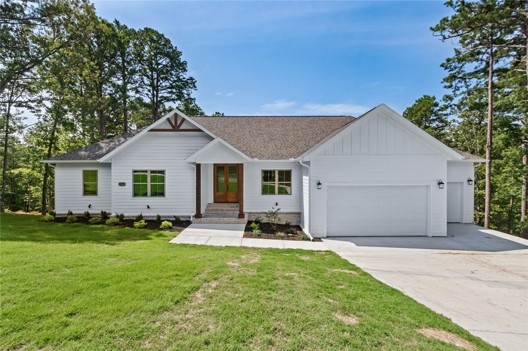 This Beaver Lake area home has it all. Featuring an open floor plan, hardwood flooring, custom trim and cabinets, oversized 3 car garage, 4th bedroom is a second master/ensuite with full 3rd bathroom, large pantry and a huge covered deck with lots of privacy.