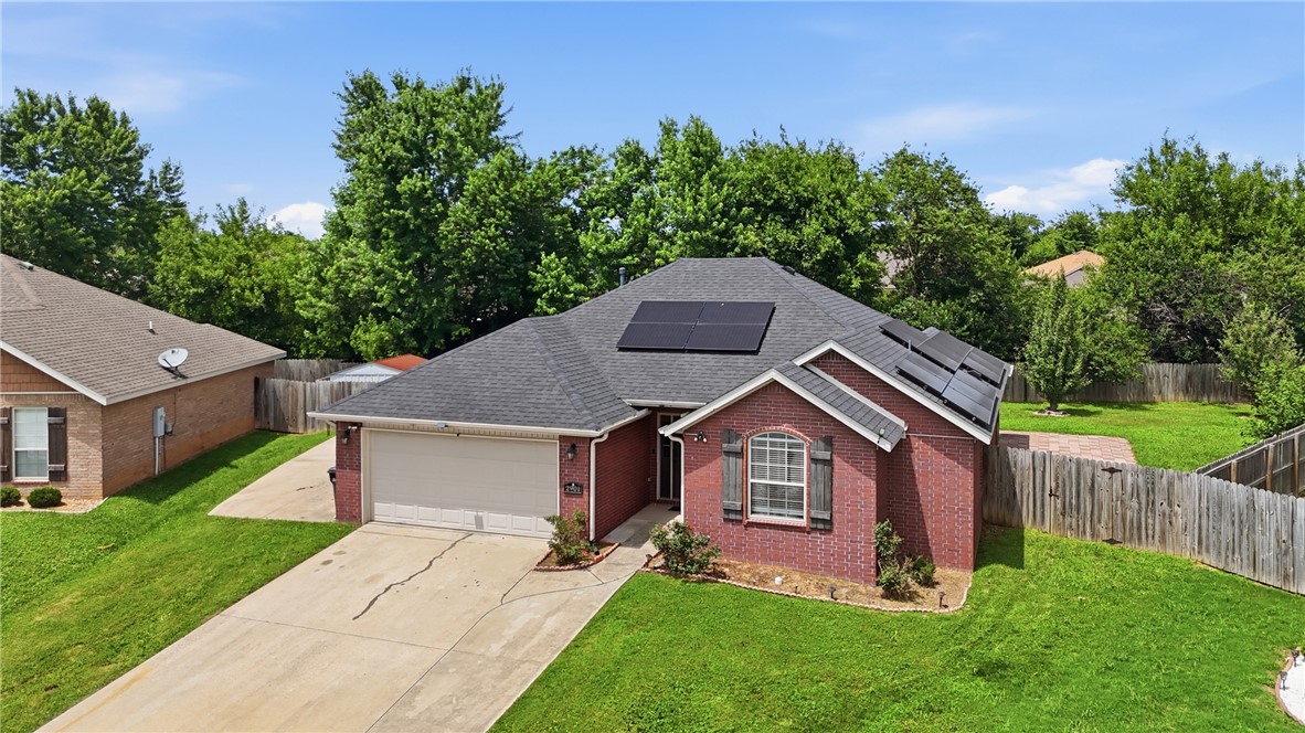 Looking for the perfect NWA location? This turnkey Rogers 3-bed 2-bath home places you minutes from Downtown Rogers, the Promenade, top-tier dining, and the area’s premier walking and biking trails! Enjoy ultimate peace of mind with a 3-year-old roof and HVAC system. Inside, you’ll find easy-to-maintain vinyl plank flooring throughout the bedrooms, excellent walk-in closets, and an expansive primary suite designed for relaxation. Say goodbye to high electric bills—this home features fully paid-for solar panels that convey to the new owner for immediate savings! Step outside to your private backyard oasis, boasting a covered outdoor patio, full privacy fencing, and a generous .23-acre lot perfect for entertaining or pets. Bonus storage is a breeze with the included 10x12 storage shed. Combining an unbeatable location, major mechanical updates, and incredible energy efficiency, this home is a rare find in Rogers. Schedule your tour today!