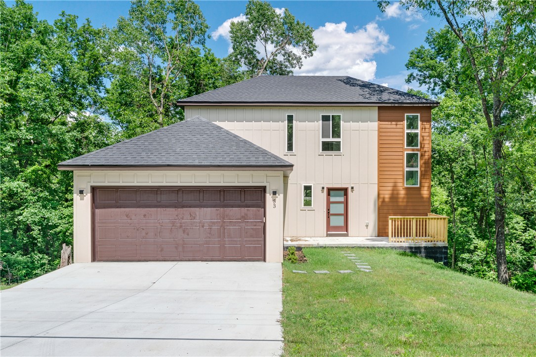 Welcome to this newly built home in Bella Vista, set in a quiet, natural setting with the area’s signature outdoor lifestyle. The main level is designed for easy everyday living, with the kitchen opening into the dining area and living room in a simple, connected layout that works well for daily use and entertaining, while the deck just off the main living area extends the space outdoors with peaceful views and a great place to unwind.  Upstairs, all bedrooms are thoughtfully placed together, including the primary suite with its own private bathroom, along with two additional bedrooms and a full bath, offering a convenient and private layout for family or guests. This location offers quick access to Bella Vista’s lakes, trails, golf courses, parks, and local dining, with outdoor recreation and nature just minutes away. A newly built home that blends simple, functional living with the best of Bella Vista. ALSO LISTED FOR RENT MLS 1348805.