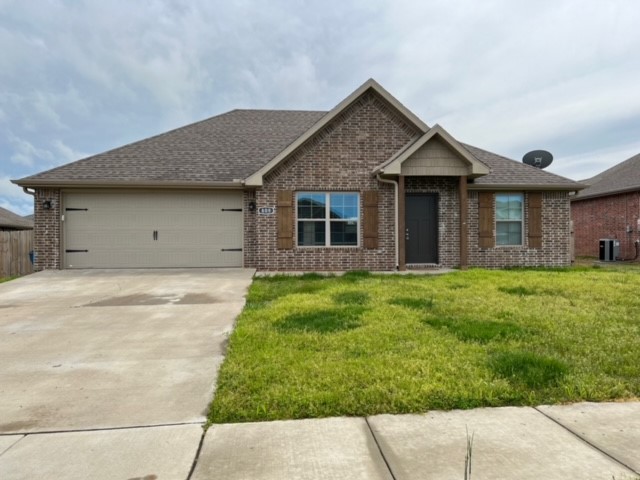 Cute all brick home with brand new paint and carpet throughout. This house is move-in ready!  Kitchen has cute island, white cabinetry, stainless appliances and large pantry.  Generous master bedroom with tray ceiling and large walk in closet. Master bath features double sinks, tub/shower combo with tile surround, private toilet closet.  Beautiful wood floors and vaulted ceilings in living room give a grand feel as you walk into this beautiful home.  2 car garage and great fenced in back yard. Bentonville schools!