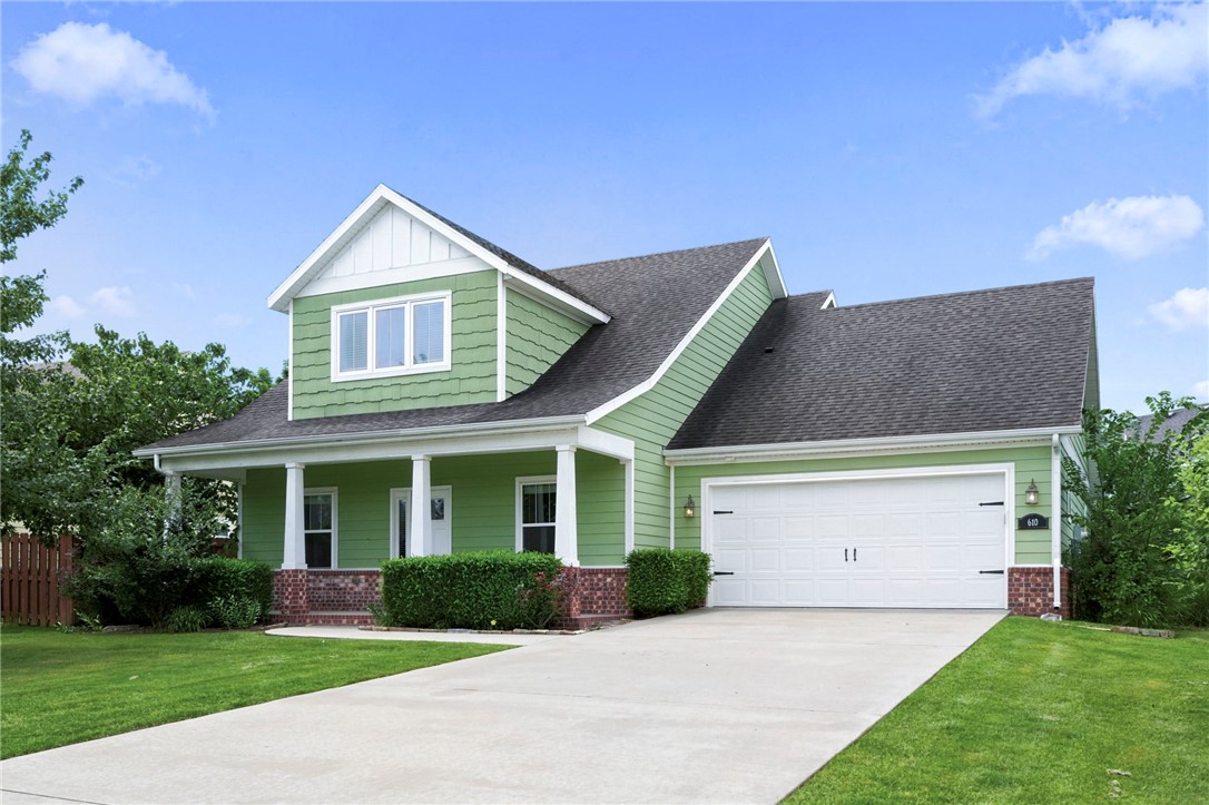 Situated on a cul-de-sac in Rocky Creek Subdivision, you'll enjoy quick access to I-49, Pinnacle Hills Promenade, the Walmart Amp, award winning dining, and more! This 1962 sq ft Craftsman includes 4 bedrooms, 2.5 baths, laundry room with sink and storage, 2 car garage, and covered back patio with a gas hookup for grilling! The spacious primary suite includes a walk-in shower, oversized soaking tub, and generous walk-in closet. Kitchen features a large island with eat-at bar, granite countertops, pantry, Bosch stainless appliances, gas range, under-cabinet lighting, and roll-out drawers. Additional features include dual-zone thermostats, central vacuum system, tray ceilings, luxury vinyl plank floors throughout, gas-log fireplace, crown molding, and adorable covered front porch! The expansive fully floored attic offers potential to finish additional living space. Whether you're searching for your next home or a smart investment, this home offers the perfect combination of location, quality, and value.