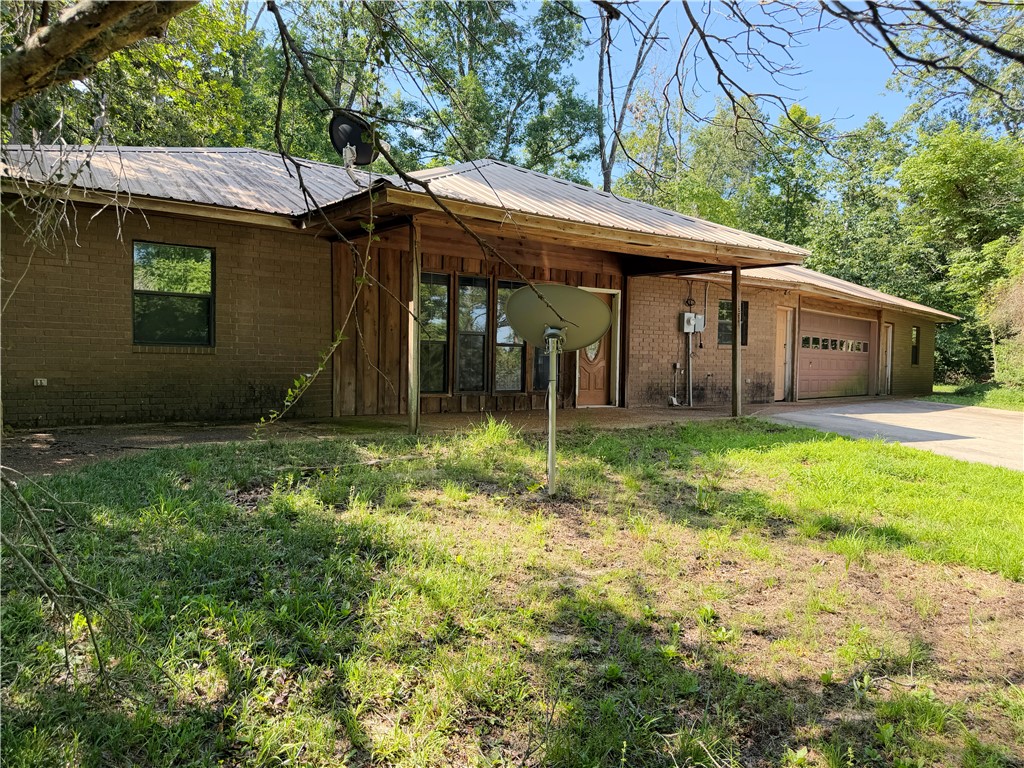 Check out this home that is sitting high and mighty. It is waiting for you to come make it your own. Featuring three bedrooms, attached garage, fireplace in the living room and plenty of mature trees. Buyer to verify all information on property. Call today to schedule a look!