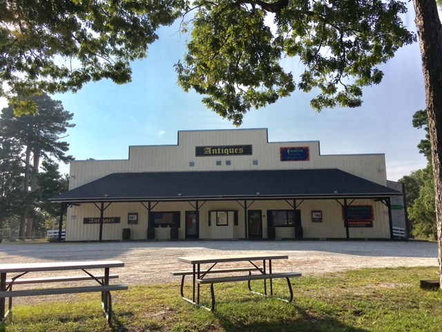 Former large theater building.  Building has two apartments, large stage and theater seating.  Stage curtains convey.  Amazing electric supply system.  Full sprinkler and security system through the whole building.  Supplement electric for two food trucks, with licence for the two trucks.  Large bathrooms in the lobby area and additional bathrooms back stage.  Huge parking area.  Could be adapted to many uses.  Lots of storage in the unfinished basement area.  Fabulous price for this location.