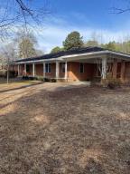 This 2280 sq. ft, one owner,3 bed/2 bath home. with a bonus room. sits back off Hwy 22, just a short distance from Dardanelle. This well maintained home has a nice size front porch where you can sit and enjoy your morning coffee. It has two living areas,  with one having a brick fireplace for these winter days.  The kitchen, which has been updated with new appliances and Corian countertops, includes a nice breakfast nook.  All of this is sitting on 2.13 acres.  Agents, please see private remarks.