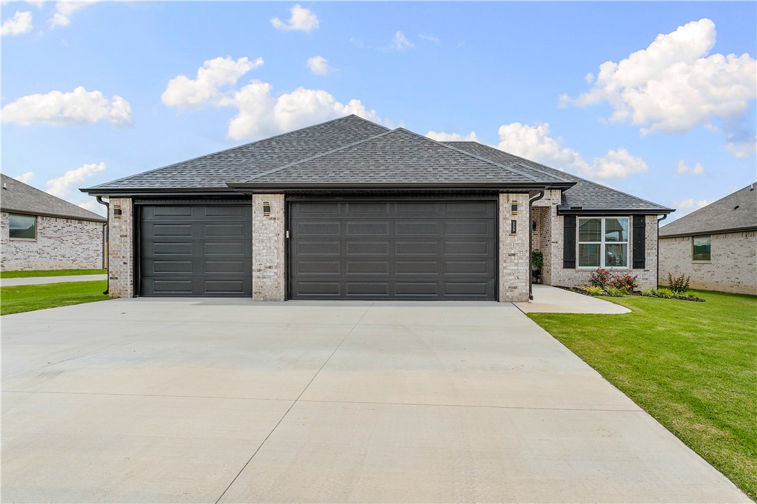Offering the feel of new construction without the wait. Inside, you’ll find scratch-resistant waterproof laminate flooring, soft-close cabinetry, granite surfaces & a zero-entry floorplan. The open-concept layout centers around a spacious eat-in kitchen with a coffee nook & ample storage. The split floor plan provides privacy & flexibility, w/ a front office enclosed by a frosted glass barn door. The primary suite features a tray ceiling, large walk-in closet w/ built-ins & direct laundry room access. The spa-like bath includes dual vanity with seated center space, soaking tub & fully tiled walk-in shower. Secondary bedrooms feature custom closet systems, while the mudroom adds functionality with built-in seating & storage. Additional upgrades include custom shiplap accents surrounding the fireplace and primary bath, walkable attic w/ extra insulation, XL water heater, blinds, gutters & oversized 3-car garage. Outside, enjoy a fully fenced backyard, covered patio with retractable sun screen & peaceful Bluff views.