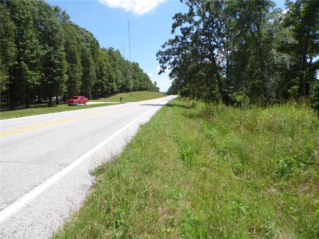 416' MOL of Hwy. frontage.  Unrestricted property suitable for either business, home or combination.  Less than 10 minutes to Eureka Springs.  Agent is on Board of Directors and is Stockholder of Cornerstone Bank.