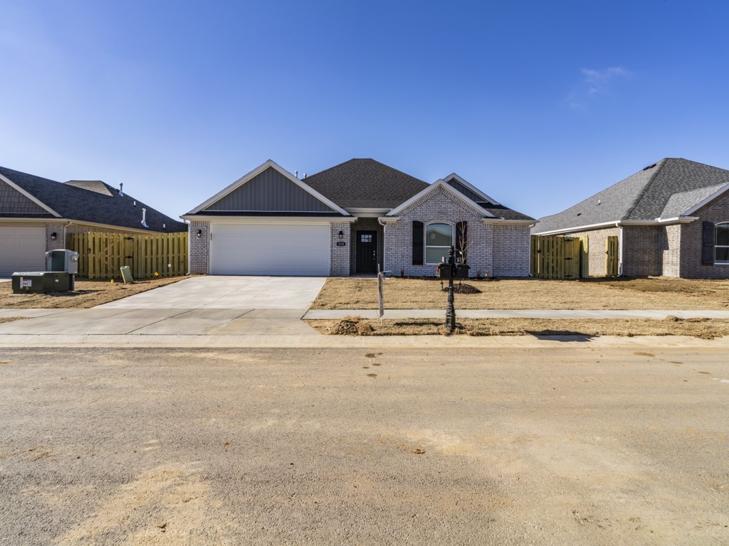 A spacious 3 bedroom, 2 bath, 2 car garage home in Southwind SUB. Open living and kitchen. All stainless steel appliances to convey, vinyl flooring in main areas, granite counters & gas log fireplace to enjoy. Large primary bathroom with jacuzzi and stand alone shower. Covered patio and large fenced yard for privacy.  Pets considered with increased rent & deposit.