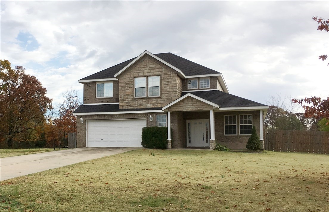 Hard to find over-sized, FLAT yard in Bella Vista - 2 lots totaling .59 acres. All new HVAC, septic emptied in 2018. New carpet on stairs, new trim. Many updates over the last 2-3 years including paint, flooring, dishwasher, and fencing. Master suite has huge closet, Jacuzzi tub, gas logs fireplace. Very secluded yet minutes from Gravette and less than 20 minutes to Bentonville. *Note the trim in living room and dining/office has been completed since photos were taken*