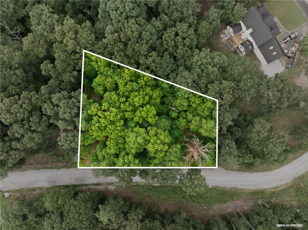 Build your dream home on this beautiful homesite in the desirable Berkshire Subdivision of Bella Vista Village! Lot 55, Block 5 offers an excellent building site just minutes from Lake Ann. The property has already been surveyed and perc tested, with public water and electric available, making it even easier to begin planning your new home. Located in the highly sought-after Bentonville School District, this lot offers the perfect blend of peaceful natural surroundings and convenient access to everything Northwest Arkansas has to offer. Whether you're ready to build your forever home or invest for the future, this is an opportunity you won't want to miss.