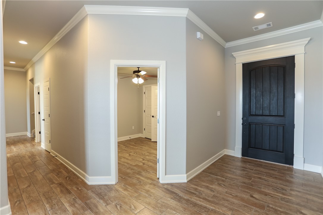 Spacious NEW construction home in Tamarron subdivision in Centerton. Located in Bentonville school district, just minutes from schools. 4 bedrooms(4th optional office/library) on main level with a large Bonus Room/5th Bedroom on second level. Two full baths on main level and one full bath upstairs. Large living area, open kitchen which includes an eat-in-area. Includes 3 cm granite, 2" faux wood blinds, gutters, privacy fence, and fully sodded yard.