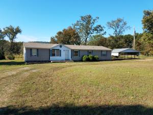 Lot of house for little price! Nice 4 bedroom home with 2.5 acres on top of Linker Mt. 2 Large living rooms that open up to the large kitchen with an island in the middle. Large out building that conveys along with washer, dryer, refrigerator, and freezer. All for a cheap price of $62,000!