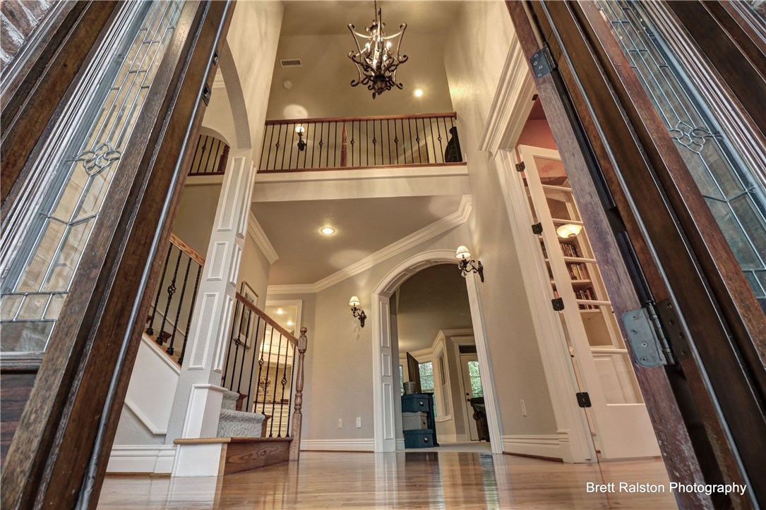 Immaculate French Country home w/beautiful trim, built-ins, tons of storage! Main floor...Living, Office w/built-ins & vaulted ceiling, Kitchen, Breakfast nook, Living Room, 1/2 bath, Separate laundry, Master Suite w/sitting area.Upstairs 3 bedrooms (2 connected by Jack & Jill bathroom; 3rd one w/separate bath)  Bonus room up. Walk-in closets. Partially covered deck.  Backyard with trees, backs up to trail.  Walking distance to Crystal Bridges, Amazeum; short drive to Walmart & easy access to I-49.