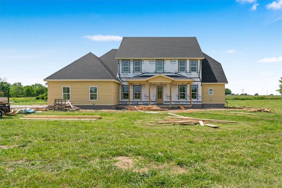 Look forward to coming home to Springdale's newest subdivision, Magnolia Meadows off Harmon Rd
Fayetteville address, Springdale Schools, near Tontitown. One acre lots, 3 car garage, 3200-3800 sq ft
homes planned. Just getting started but this home has 4 bedrooms, 4.5 bathroom, study and media room.
Front porch, back deck and all the spaces you need. Sprinkler system will be installed in the sodded areas of the yard as well.  Come check it out.