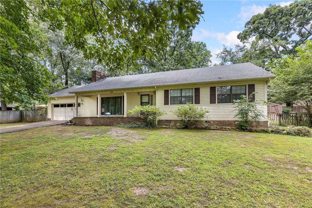 The price is more than right on this one! This 3 Bedroom, 2 Full Bath family home with 1,600+ square feet of living space in Harrison West is priced to sell and full of potential! While it hasn’t been recently updated it has been exceptionally well cared for and clearly reflects pride of ownership throughout...just take a look at that pristine white carpet! The home features a number of timeless details, including a beautiful flagstone porch, beveled glass cottage-style kitchen windows that open for fresh air, and a cozy gas-insert fireplace framed by built-in cabinetry. The living room showcases floor-to-ceiling windows with  views of the tree-filled yard.  The dining room showcases a set of French doors that takes you out to your back deck. The cutest kitchen with cabinetry and wallpaper that add character and charm, and are in such great condition you may even choose to keep them as-is! Located in a sought-after neighborhood and offered at an attractive price point, this home is the perfect opportunity for you!