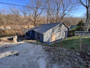 Looking for a home to fix up for a rental!  Check out this location.  Walking distance to the hospital, grocery store, and square.  Perfect to supplement your income with a rental property.