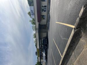 Location, Location, Location. Property sits 4 blocks from the center or Russellville with 2 good stable tenants already in place.  Come take a look at this income producing property. NEW FRESH COAT OF EXTERIOR PAINT.  11/1/24