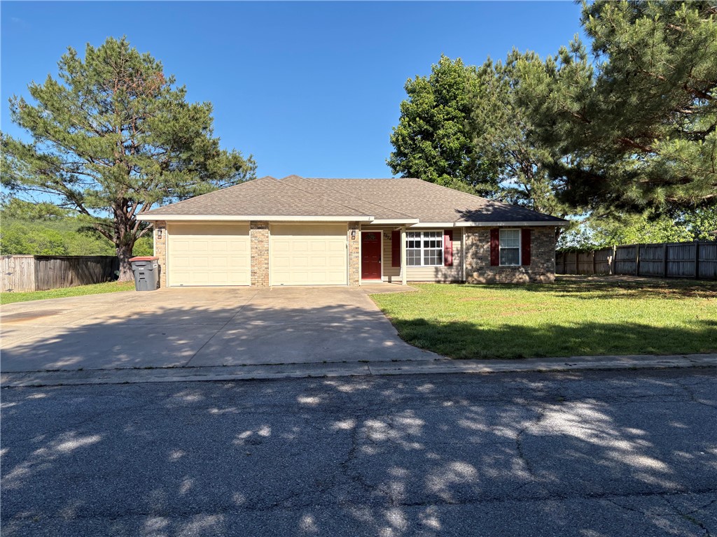 Charming 3 bedroom, 2 bathroom home with 1456 sq ft featuring a spacious open floor plan all on one level. Nestled in a quite neighborhood just outside of town. This home offers the perfect balance of peaceful living with convenient access to shopping, dining and schools. Step out back and enjoy relaxing views of a beautiful open field where horses graze, creating a serene country feel right from your own backyard. Recent updates include all new paint throughout the home, new LVP flooring, new blinds, painted garage floor, new stove and hood fan. The home has a 2 car garage but has additional parking for a third vehicle.