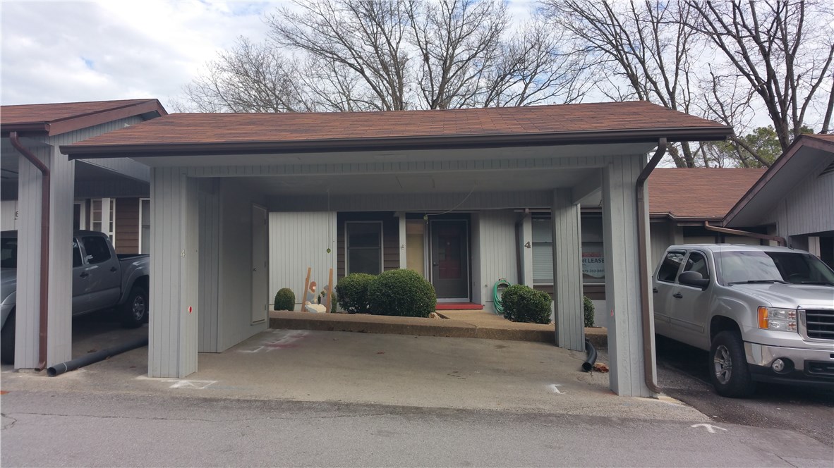 Golf front townhouse that will make you smile, with a stunning sun room that has a wood ceiling and access to the golf course, and a deck to enjoy the summer breezes. 2 Car Carport with storage. A super find at this price!