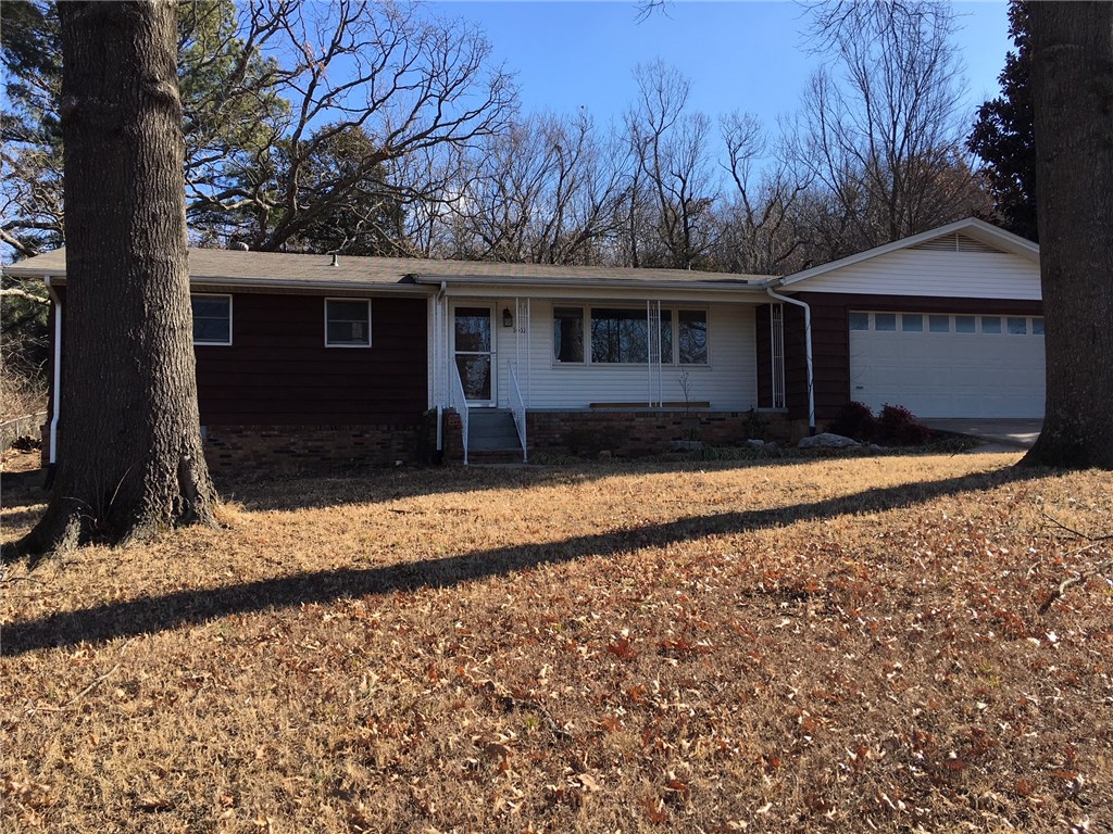 Nicely remodeled 3/2 near campus features 2 living areas, 2 car garage, nice backyard, and high-efficiency heating and cooling. Refrig, washer, dryer provided.