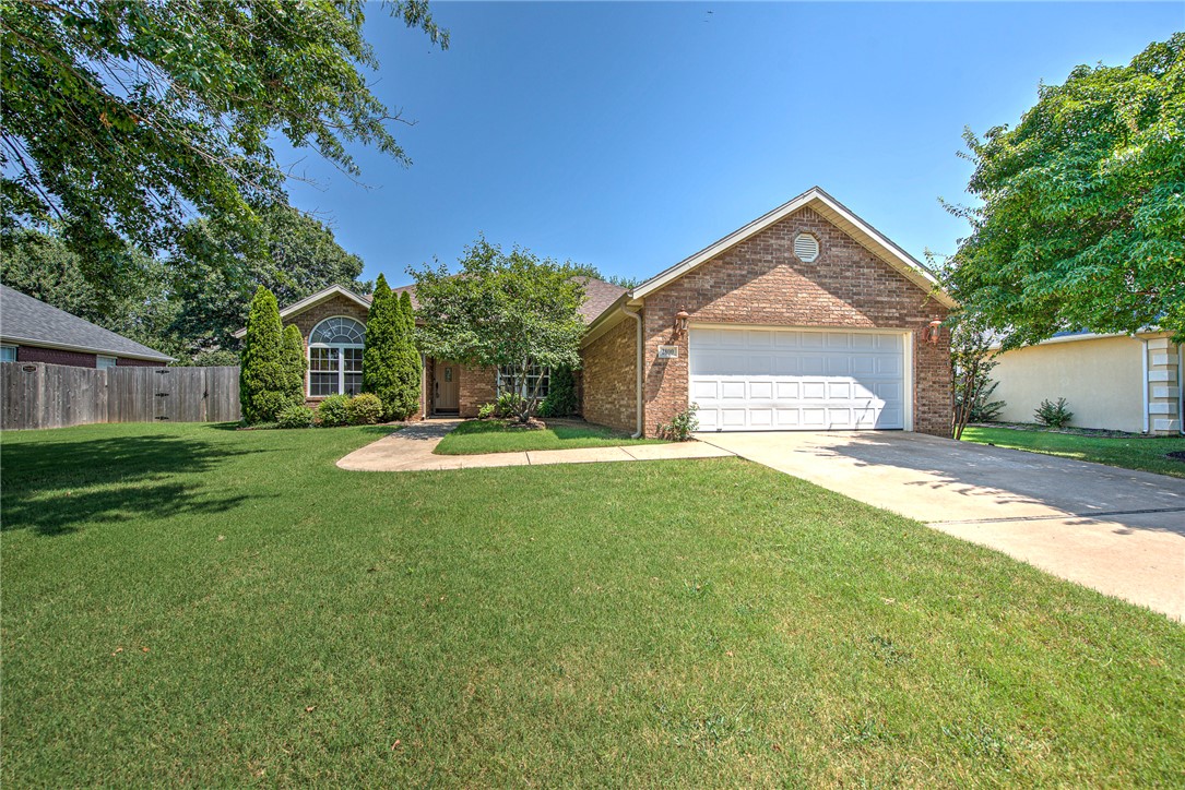 Enjoy living in the desirable Springdale neighborhood of Saddlebrook with easy access to all that Northwest Arkansas has to offer! This inviting home combines a functional layout with comfortable indoor and outdoor living. The open floor plan features an open, spacious living area and eat-in kitchen with a peninsula that provides additional seating and creates an easy flow for everyday living and entertaining. The generous primary suite offers direct patio access, a spacious bath, and two walk-in closets. Step outside to a beautifully landscaped, one of a kind backyard designed for relaxing and enjoying the outdoors. An exquisite koi pond, flagstone walkway, patio area, and outdoor storage add charm and functionality to the space. With its thoughtful layout, inviting backyard, and central location near shopping, dining, employment centers, and major NWA destinations, this Springdale home is ready to impress.