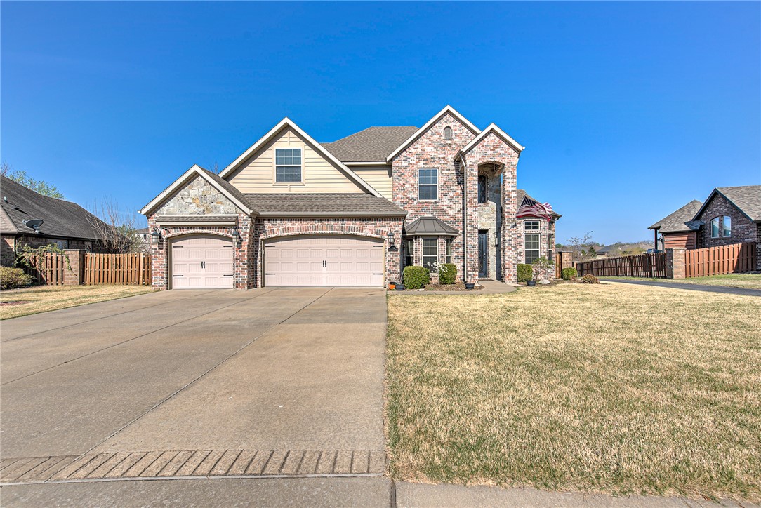 Seize this rare opportunity to own a well maintained two-story brick home featuring a main-level primary suite and a dedicated home office. Luxury meets practicality with temperature-controlled heated floors in the primary bathroom, keeping you warm no matter the season. The open-concept gourmet kitchen boasts a large prep island and built-in ice maker, overlooking the living space and formal dining area. High-end finishes include genuine hardwoods throughout the main level and durable tile in all wet areas. The second floor is designed for flexibility, housing three guest bedrooms and an expansive bonus room. Enjoy outdoor living on the covered rear porch with serene views of the community common area. This home offers peace of mind year-round with the inclusion of a reliable Generac whole-house generator, ensuring uninterrupted comfort and power no matter the conditions. A perfect home for those who value privacy while enjoying ample space to entertain in style.