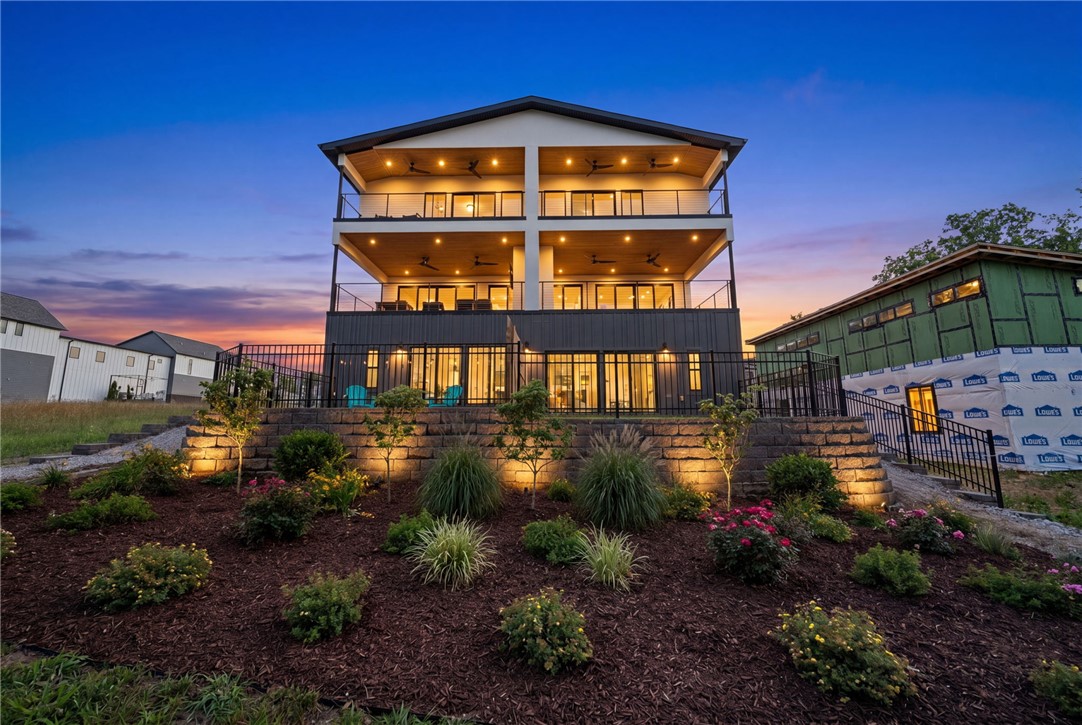 Welcome to the pinnacle of trailside living at Fillmore Trailside! The premier unit of this exclusive community, this custom masterwork spans 3,007sft (4br/4.5ba/3car-garage). Positioned in the most elite mountain biking location in NWA, the estate delivers direct, private access steps away from the Flow Connector Hub, and offering an elite triple-tiered balcony system with dramatic, uninterrupted views of the world's most famous trails.

Inside, luxury elevates every sqft with a floating staircase, under-cabinet lighting, and designer tile. The chef’s kitchen serves as a high-end centerpiece, boasting a monster island, premium side-by-side refrigerator, and professional gas range. The master suite acts as a private oasis, featuring an enormous luxury bathroom and secluded balcony overlooking the trails. Designed for flawless hosting, the 2nd floor opens to an entertainment deck equipped with an outdoor fireplace. Pedal or stroll just minutes to the unmatched dining, art, and lifestyle of the Bentonville Square.