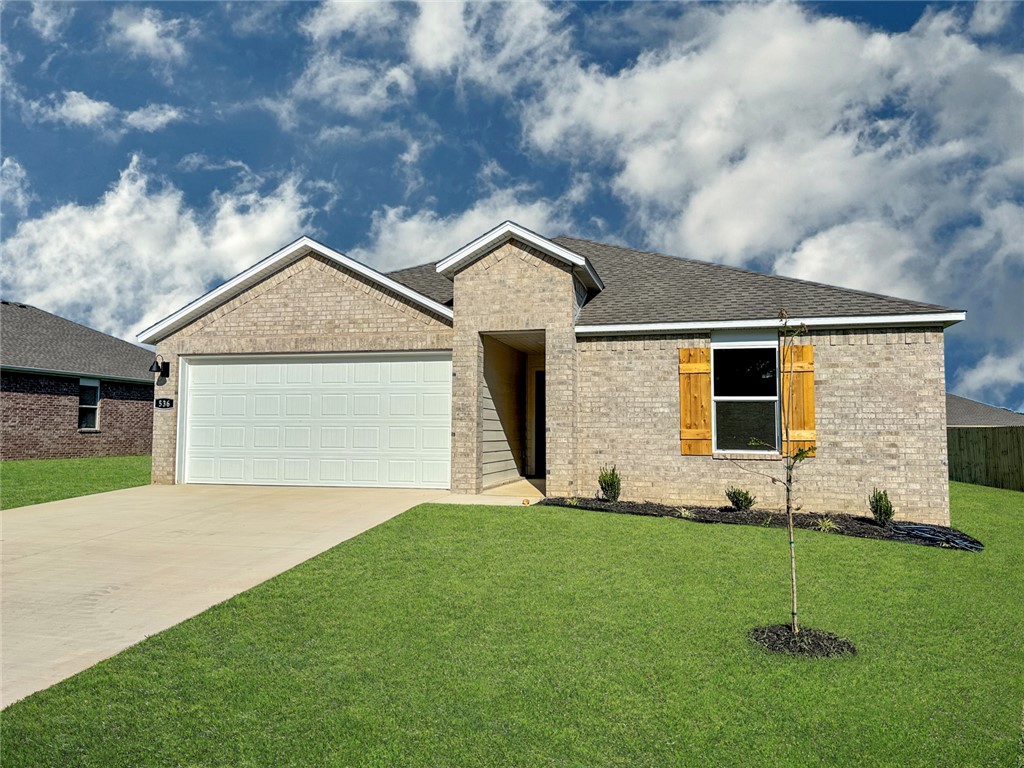 Beautiful Bellevue Plan in Wagon Wheel Phase 2, in Farmington, Arkansas! Each home in Wagon Wheel is meticulously crafted with attention to detail, creating a space that feels both luxurious and welcoming. From the moment you walk through the door, you'll be greeted by modern features and spacious a layout that caters to every lifestyle. Our homes boast premium finishes and thoughtful designs, ensuring that you'll be stepping inside your own personal oasis. These homes will be complete with LVP flooring throughout and wood shelving in all closets, pantry and utility room. The kitchen will have quartz kitchen counters, 36-inch cabinets, and stainless-steel appliances! Home will have a Garage Door Opener. Primary bath will have quartz countertops, double sinks, and an oversized walk-in shower. Each home comes with 4-sided brick with Hardie ® per plan. NO SHUTTERS. Taxes and Parcel TBD.