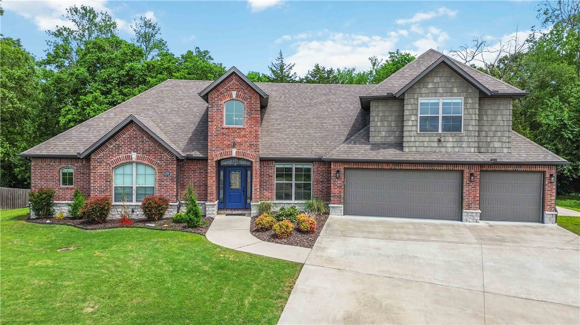 This one-of-a-kind home was designed from the ground up with one intention — to honor its setting. Every detail, inside and out, was thoughtfully chosen to draw the eye toward the back yard creek and the sweeping mountain views beyond.The exterior makes a lasting first impression with real stone wainscoting and brick, and that same attention to quality carries throughout. Inside, you'll find custom stained knotty Alder cabinetry, 3 cm granite counters, a raised bar top, and a striking fireplace hearth finished in black pearl granite. Crown molding, window valances, and vaulted ceilings in both the primary bath and front bedroom add architectural warmth that feels curated, not cookie-cutter.Four spacious bedrooms, three full baths, landing area,  and a three-car garage give you the space and function to match the style.5K in preferred lender credit