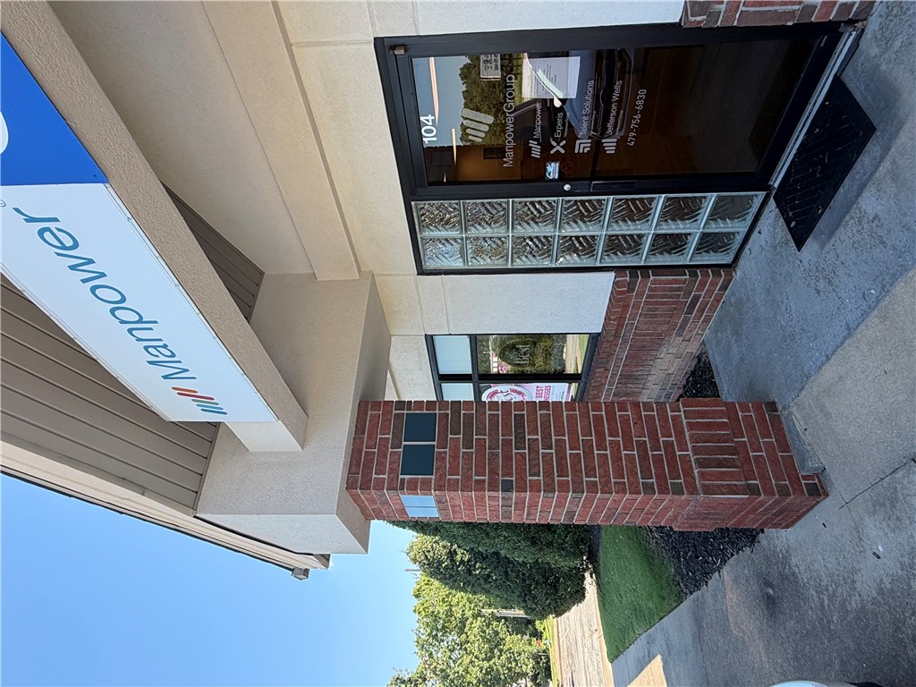 +/- 1,582 SF of professional office space is now available in the Springdale Business Park. The suite includes three private offices, a large room that can be used as a conference room, break room, or another office, two private restrooms, and a spacious reception area or open workspace area. The layout supports a wide range of office uses and benefits from the professionally managed, eight building complex. Positioned along 71 Business, the property provides strong visibility and convenient access. It is less than five minutes from Fayetteville and about ten minutes from Lowell. The space is offered on a NNN lease, with the tenant responsible all utilities and a monthly fee of $195 for water and trash service.