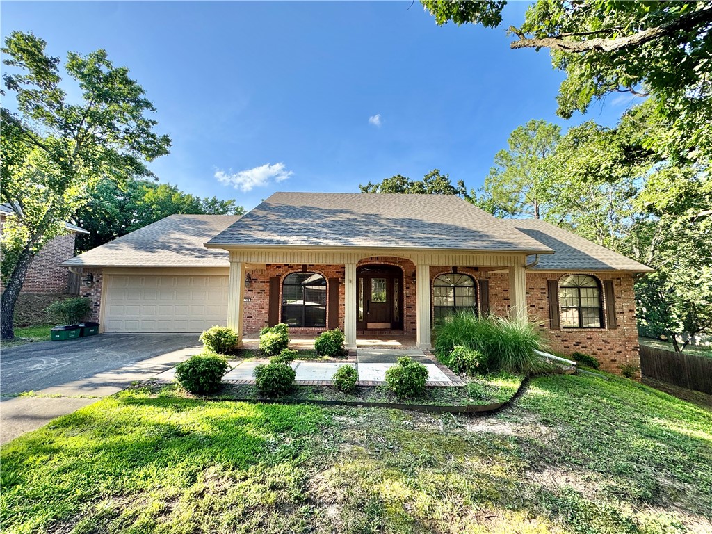 Beautiful single family home in the heart of Fayetteville.  This all brick, four bedroom, two bath home is move-in ready. Lovely entryway leads to a formal dining space and large living room. This property features a large kitchen with updated stainless steel appliances. Floor to ceiling brick fireplace with built-in cabinetry. Big covered back porch equipped with a ceiling fan overlooks the backyard. Ample storage space throughout. 2 car garage. Unbeatable location! Enjoy walks and bike rides on the Razorback Greenway that is right across Old Wire. This home is minutes from Dickson, parks, schools and is a must see! Call today for a​​‌​​​​‌​‌​​​‌‌​​​‌‌‌​​‌​​‌‌​​​​ showing.