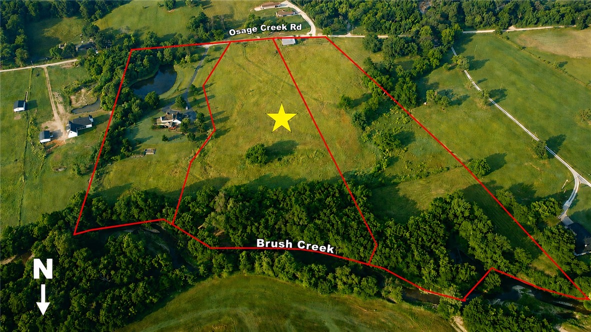 This rare 7.6-acre estate tract offers privacy, beauty, and accessibility in one of Northwest Arkansas’ most desirable corridors. Nestled in a peaceful valley along Osage Creek Road, the property is ideal for a luxury custom home, horse property, gentleman’s ranch, orchard, or serene creekside retreat.

The land features improved pasture, partial fencing, scenic views, and crystal-clear creek frontage—perfect for enjoying sunsets, floating the creek, and embracing refined country living.

Located just 2.5 miles from the new Highway 412 expansion and Highway 612 bypass, the property provides convenient access to Fayetteville, Springdale, Rogers, Bentonville, and Siloam Springs while remaining just outside Tontitown city limits.

Build-ready acreage with usable pastureland, creek frontage, privacy, and premier access is becoming increasingly difficult to find in NWA. Opportunities like this are exceptionally rare.