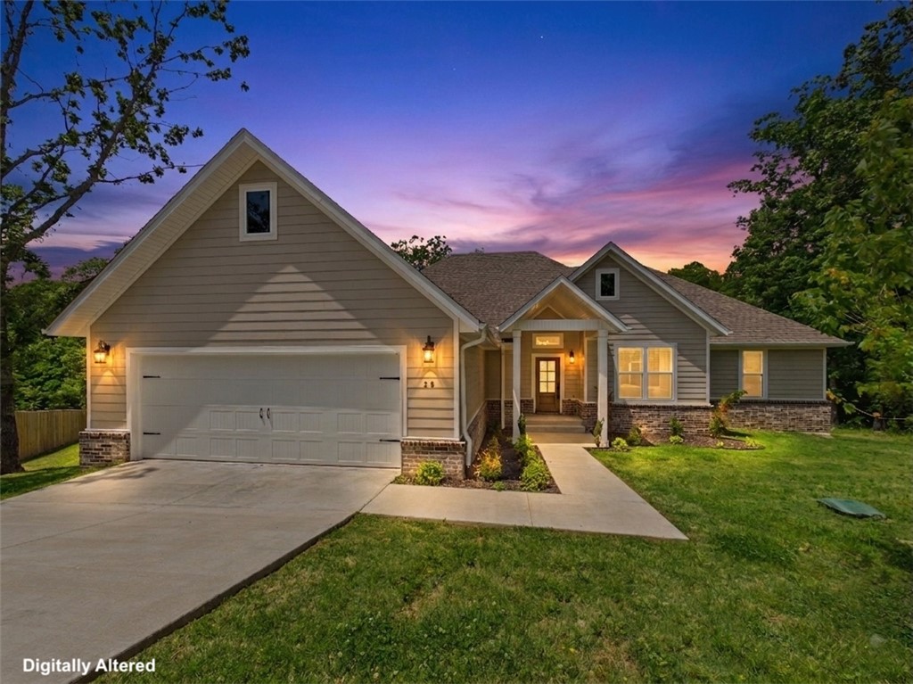 Welcome to 20 Singleton Drive — a beautifully crafted new construction home tucked away in the peaceful hills of Bella Vista. This stunning 3-bedroom, 2.5-bath home offers over 2,200 square feet of thoughtfully designed living space, blending modern elegance with everyday comfort. From the moment you walk in, you’ll notice the attention to detail, upscale finishes, and open-concept layout perfect for both relaxing and entertaining.
The spacious kitchen flows seamlessly into the main living area, creating a warm and inviting atmosphere filled with natural light. The private primary suite offers a luxurious retreat, while the additional bedrooms provide flexibility for guests, family, or a home office. Surrounded by Bella Vista’s natural beauty, this home gives you the perfect balance of peaceful living and convenient access to trails, golf, lakes, and all Northwest Arkansas has to offer.  Seller is offering $5,000 towards buyers closing costs with acceptable offer.  1 year builder warranty included.