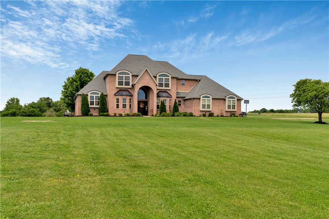 Beautiful custom-built home on 2.5 acres in the desirable Tontitown area! This spacious 4-bedroom, 3.5-bath home offers an excellent floor plan with a dedicated office, large pantry, and quality finishes throughout. The main-level is handicap accessible for added convenience and functionality. Features include wood flooring, a 3-car garage, and generous living spaces designed for comfort and entertaining. Located in the Springdale School District and just minutes from shopping, restaurants, and everyday amenities.