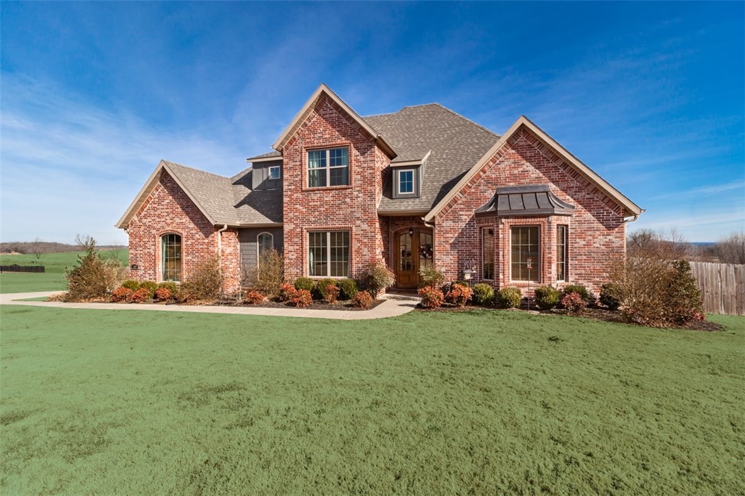 Beautiful, brick, 2 story, 4 bedroom, 3.5 bath home on 1.69 acres. Eat-in kitchen with center island, pantry, breakfast nook, family room with vaulted ceilings, gas log fireplace. Master bedroom with hardwood flooring. 2nd floor 31x13 bonus room. Intercom, security syste, central vac. Pond view to East. Front & rear irrigation. Convenient to schools, shopping and new 70 acre CL & Willie George Family Park.